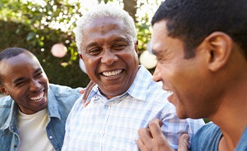 Patient in San Antonio smiling with dentures